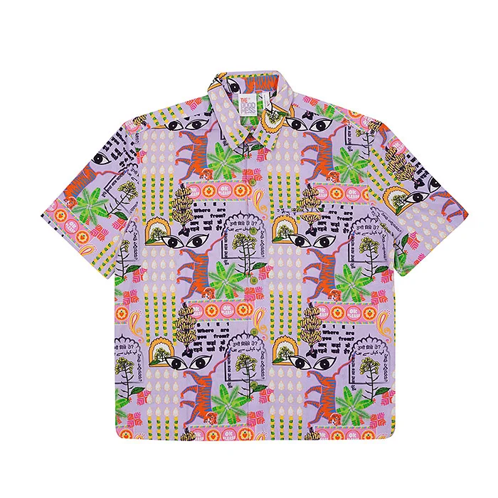 Colourful lilac boys' half-sleeve shirt with a bold tropical and abstract print photographed flat on a clean white background, a detail-rich kidswear garment ideal for a close-up shot in a kids model photoshoot