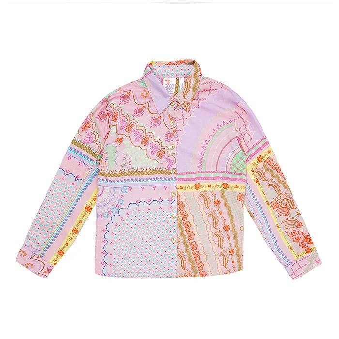 Flat lay of a pastel patchwork printed long-sleeve shirt with pink, lilac, teal and yellow panels laid neatly on a pure white background with soft even light, a consistent flat lay frame for an a+ comparison chart