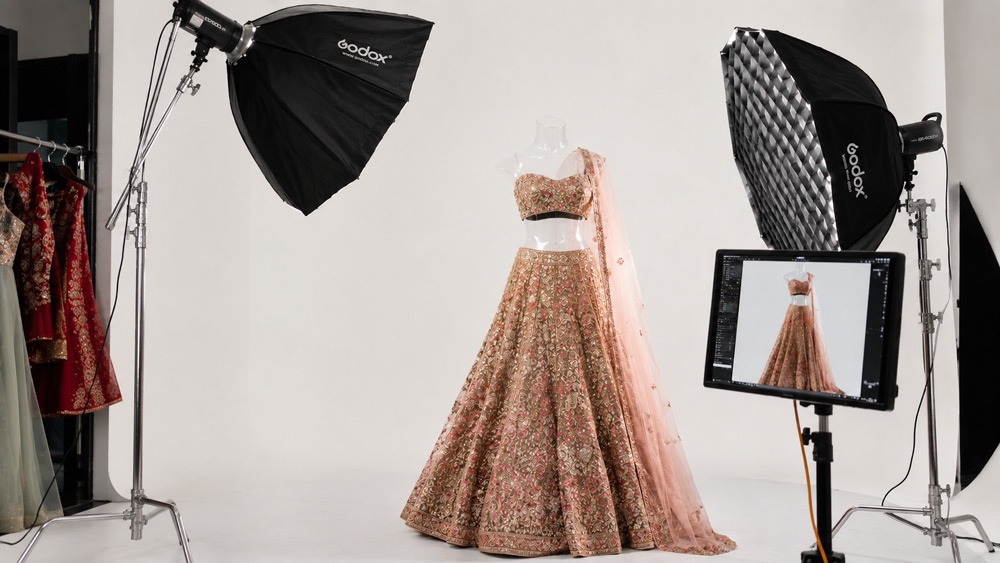 Ghost mannequin photography for fashion designers in a Delhi NCR studio showcasing a designer lehenga on invisible dummy with editorial lighting