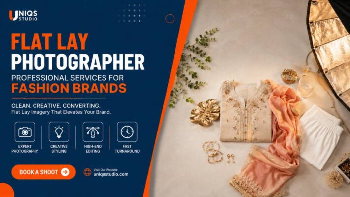 Professional flat lay photography studio setup for fashion brands featuring neatly styled clothing, accessories, premium lighting, and editorial catalogue production with promotional service banner.